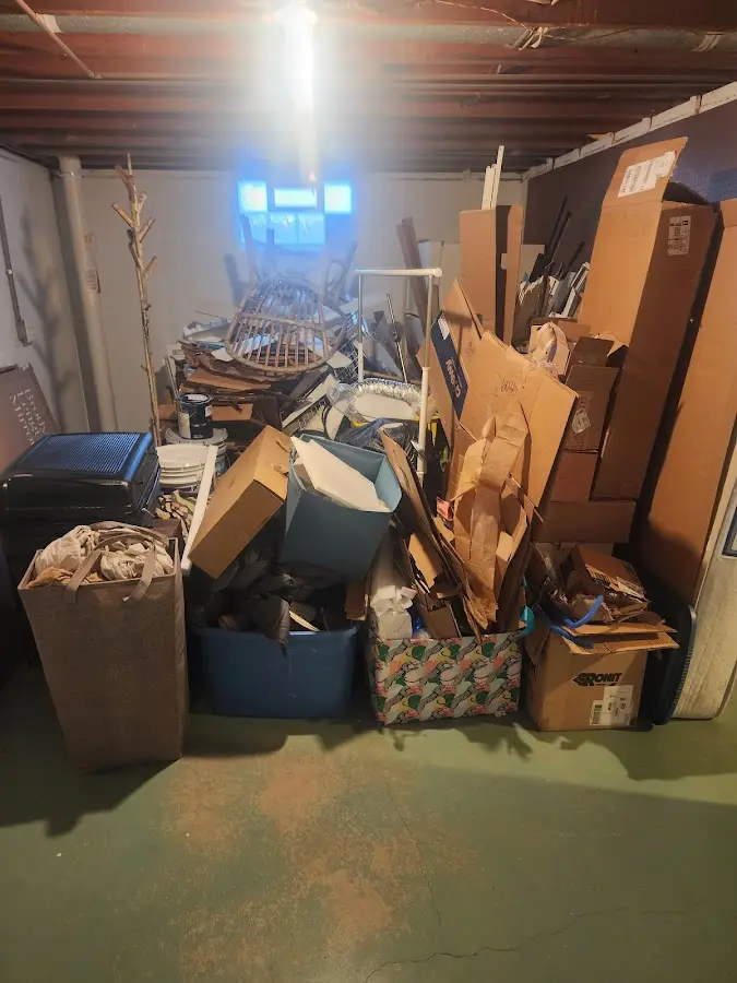 Roll-off dumpster container at job site for 4 Yard Dumpster Rental in Malden